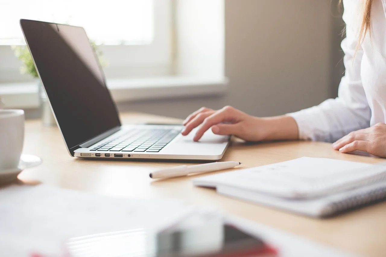 Property manager using laptop